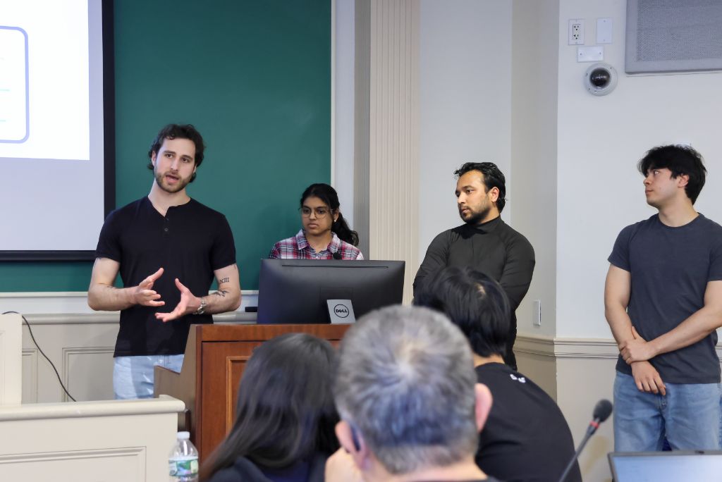 A founder presenting his AI project to a panel